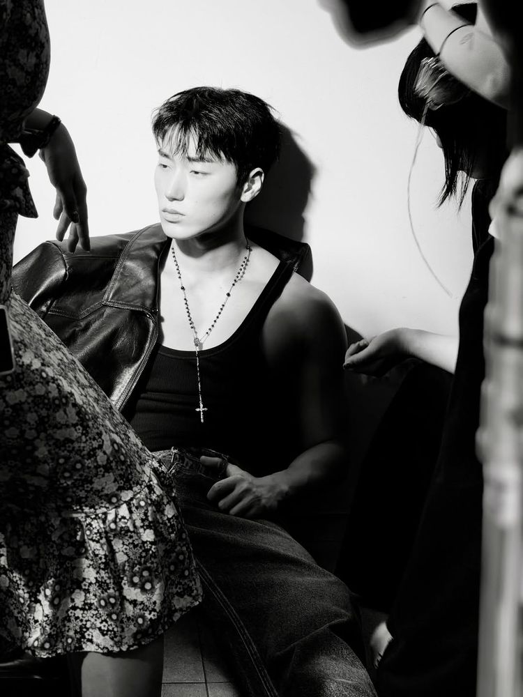 kpop group ateez member choi san in a photoshoot