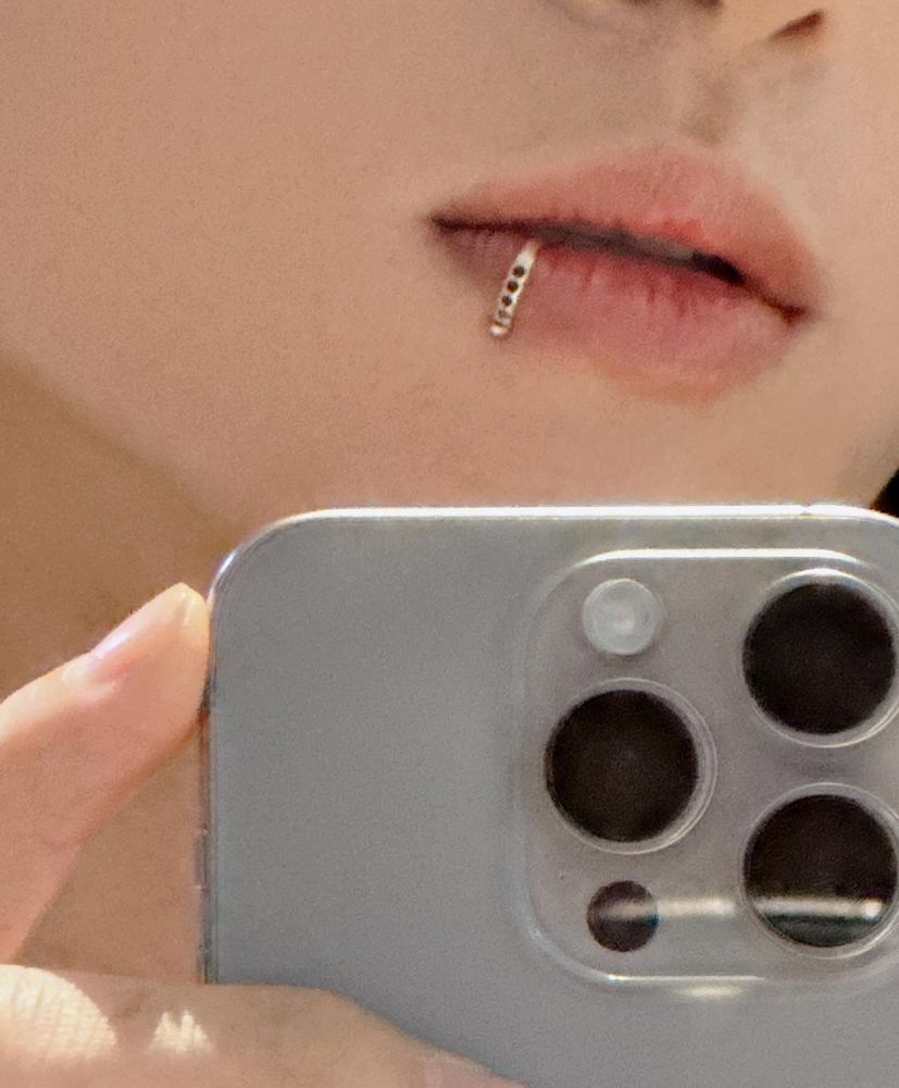zoomed in image of a lip ring and phone camera