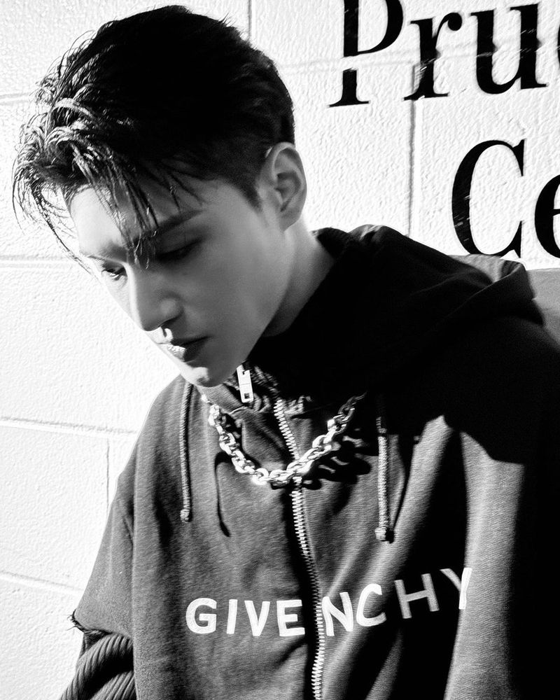 kpop group ateez member jung wooyoung in black and white photo 