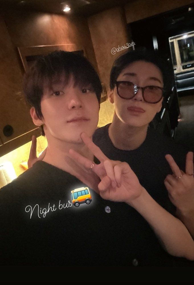 kpop group ateez members jeong yunho and choi san posing for a selfie