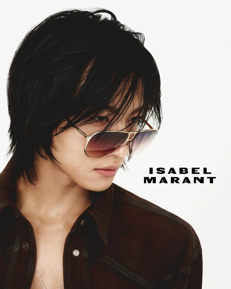 kpop group ateez member park seonghwa posing for a photo, with a caption Isabel Marant