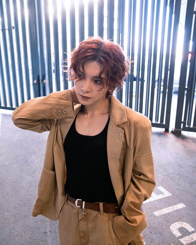 kpop group ateez member kang yeosang photographed in a casual suit