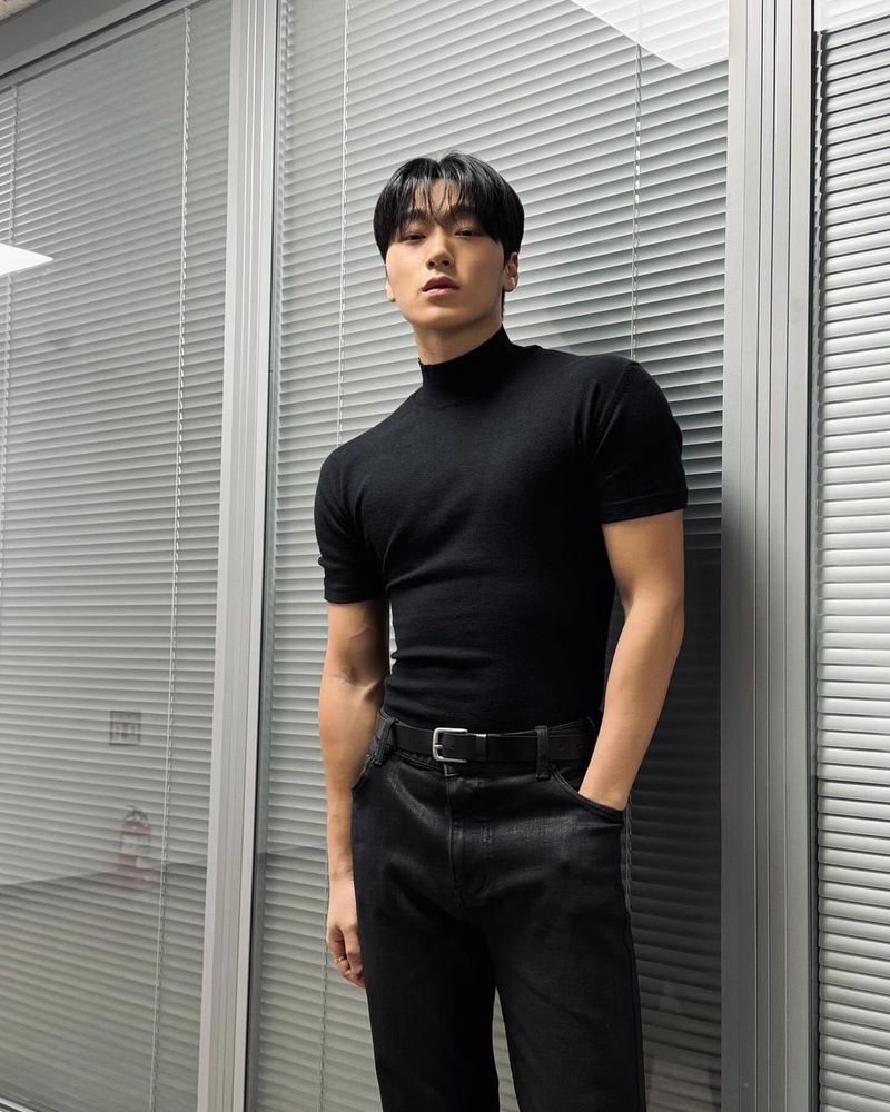 kpop group ateez member choi san posing for a photo