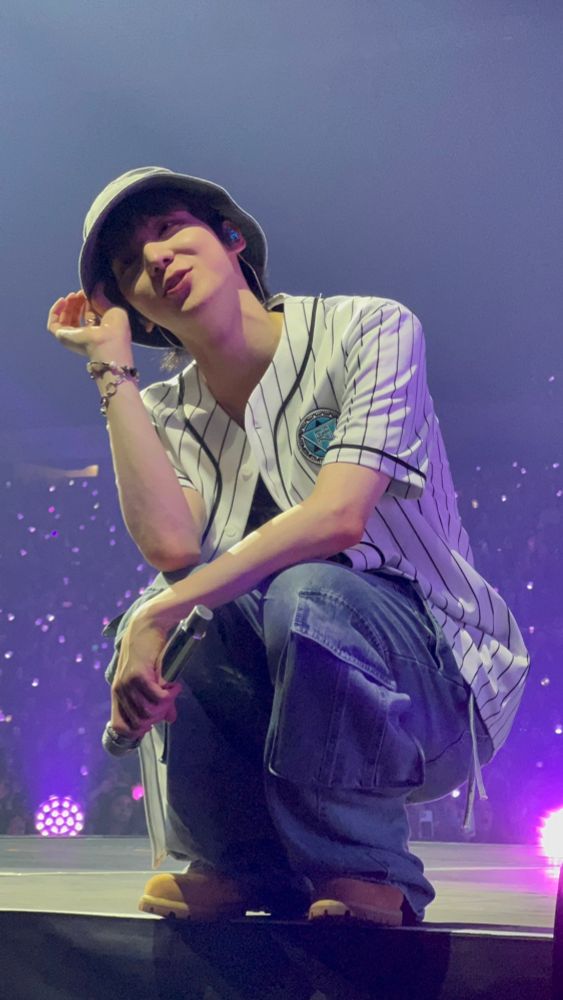 kpop group ateez member jeong yunho performing on stage