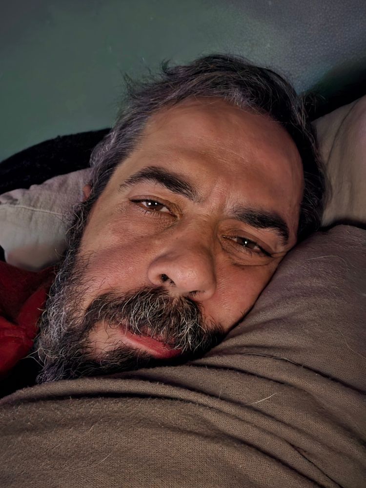 Me. Well... My head. In bed. NOT asleep. 