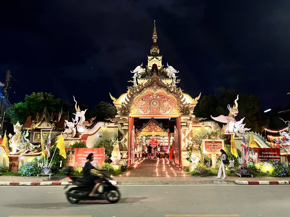 A temple lit up at night