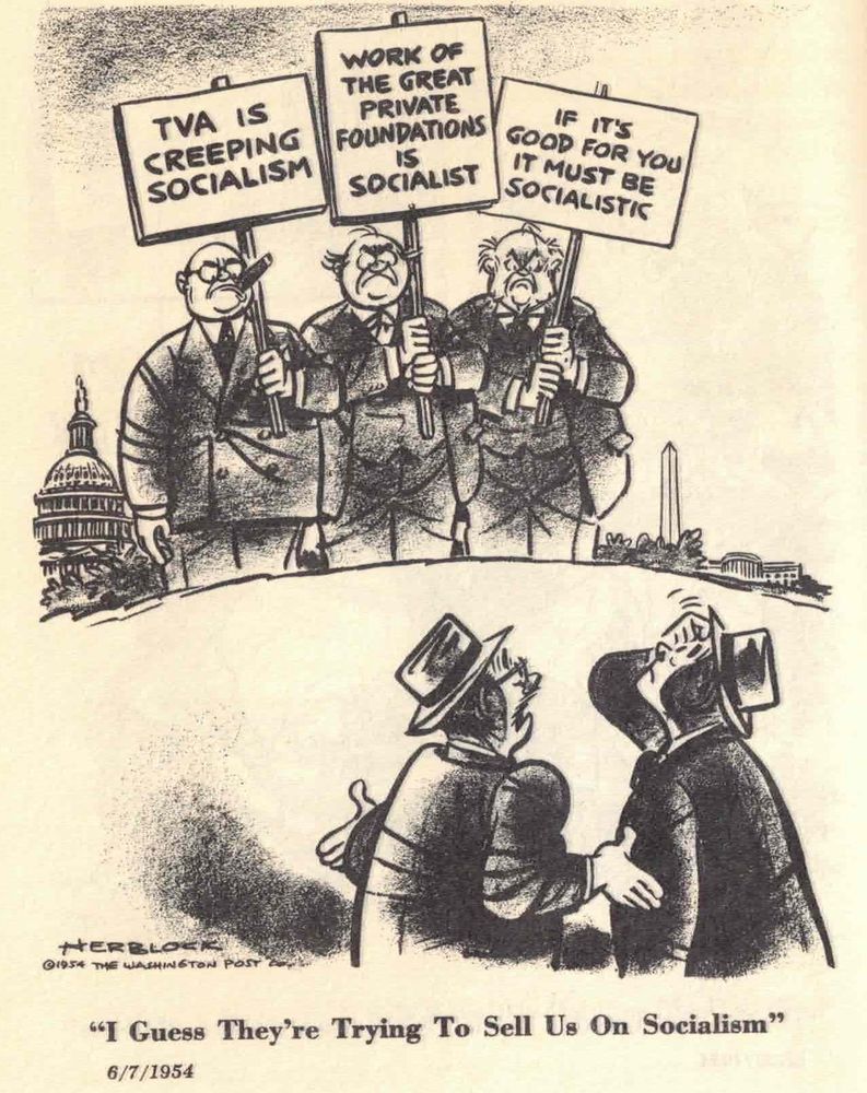 Plutocrats waving signs declaring various obviously good things (rural electrification, charitable foundations, etc) to be “socialistic”; in the foreground, one puzzled Average Guy says to another “I guess they’re trying to sell us on socialism.” June 7, 1954. 