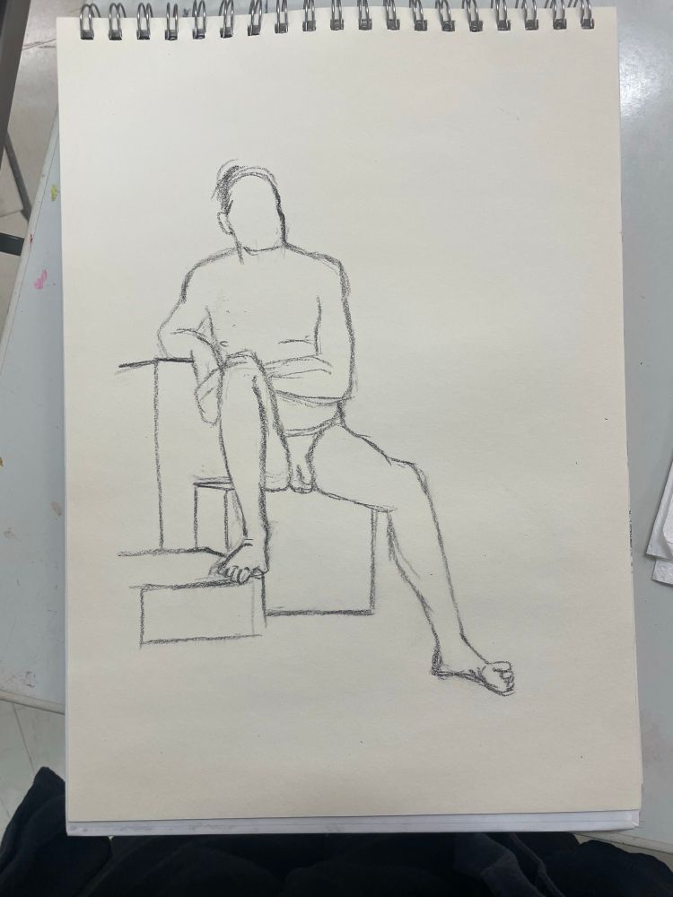 very basic charcoal sketch of a figure sitting and leaning to one side and his legs are spread all difficult like