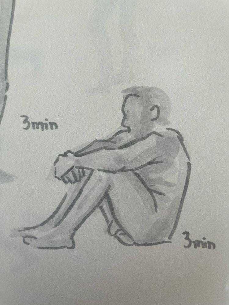 3min croquis of a dude sitting hunched over hugging his legs to his chest