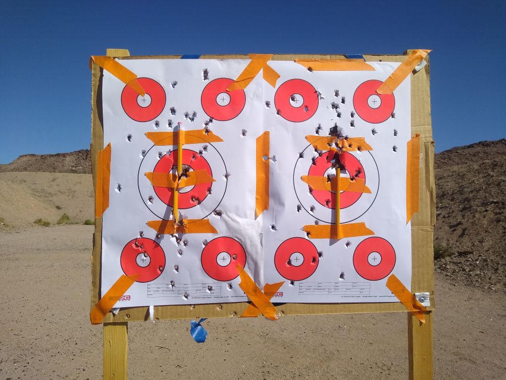 Two targets side by side, and the scatter of shots showed my missed two weeks of practice. Pencils taped to the target gives me better visual feedback than just paper.