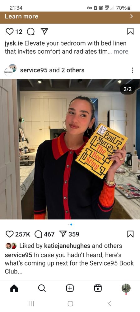 Dua lipa holding a copy of Paul Murray's The Bee Sting as part of an instagram post advertising her upcoming book club/podcast