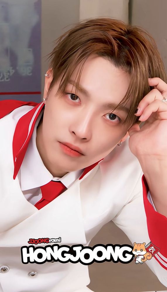 hongjoong for aniteez promo - Jjoongrami
red-haired, wearing white coat with red details he looks directly at the camera