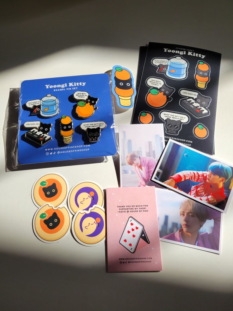 Some of Katie's super cute Tangerine Yoongi pins ans stickers