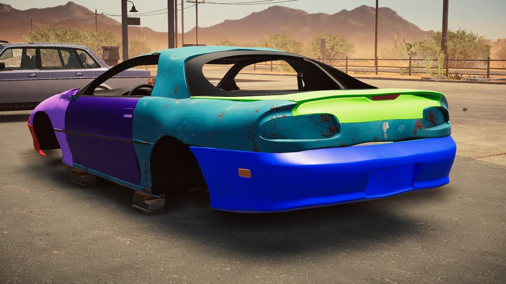 A close-up of the rear quarter of the rainbow car