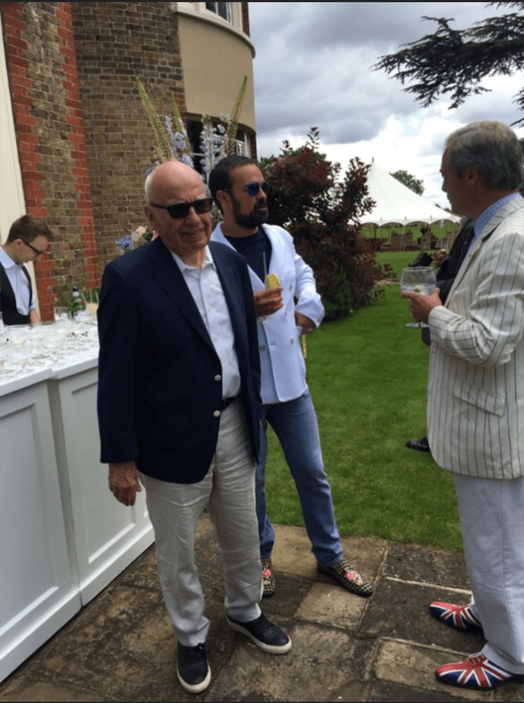 Picture of Farage at a Rupert Murdoch summer party with Lebedev wearing brash handmade Union Jack shoes. 