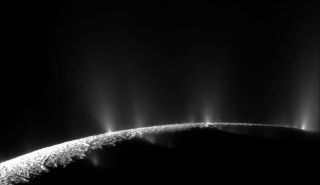 A close-up image of plumes erupting from the icey surface on Enceladus. Image via NASA.