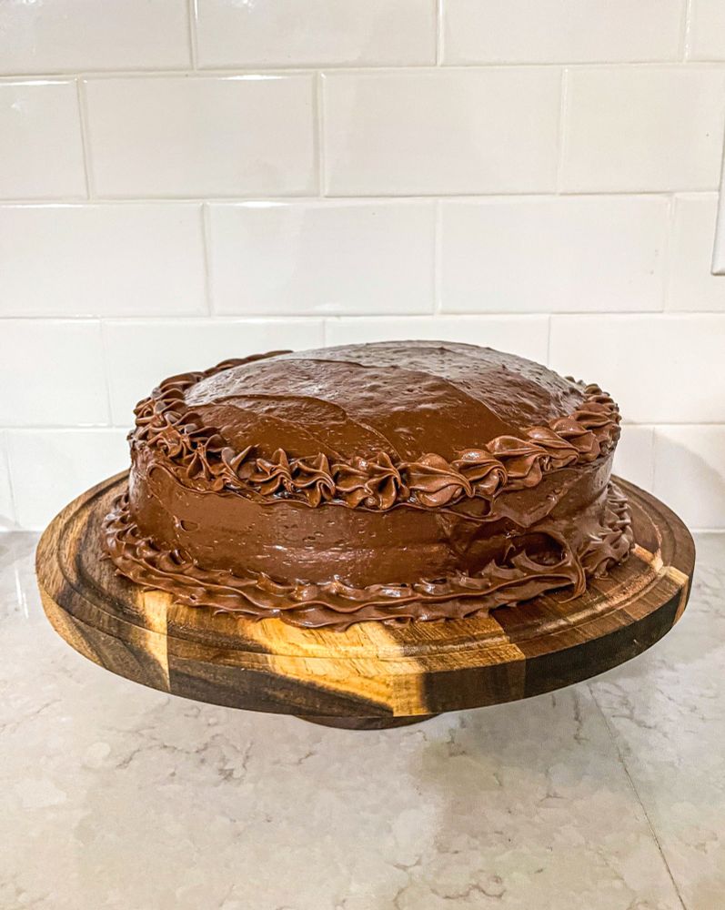 A cake with chocolate icing