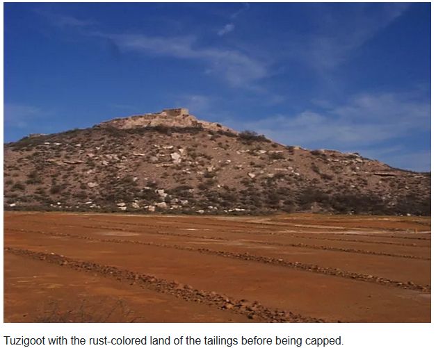 "Tuzigoot with the rust-colored land of the tailings before being capped."
Remnants from decades of depositing the by-products, or tailing slurry, of copper smelting. The ore was mined from the Jerome area, and Jerome, the ‘billion dollar copper camp’, boomed from 1883 until the closing of the mines in 1953
