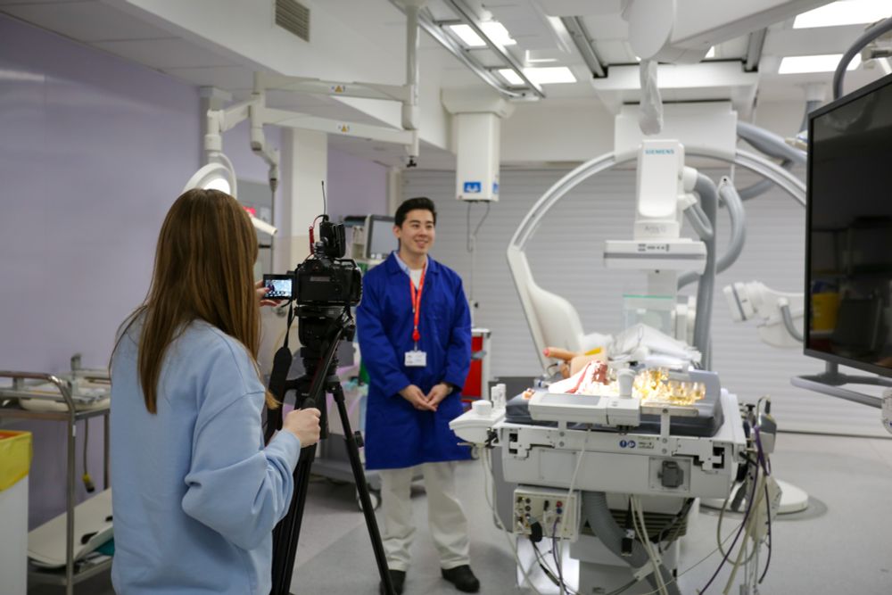 Man being filmed in a clinic setting