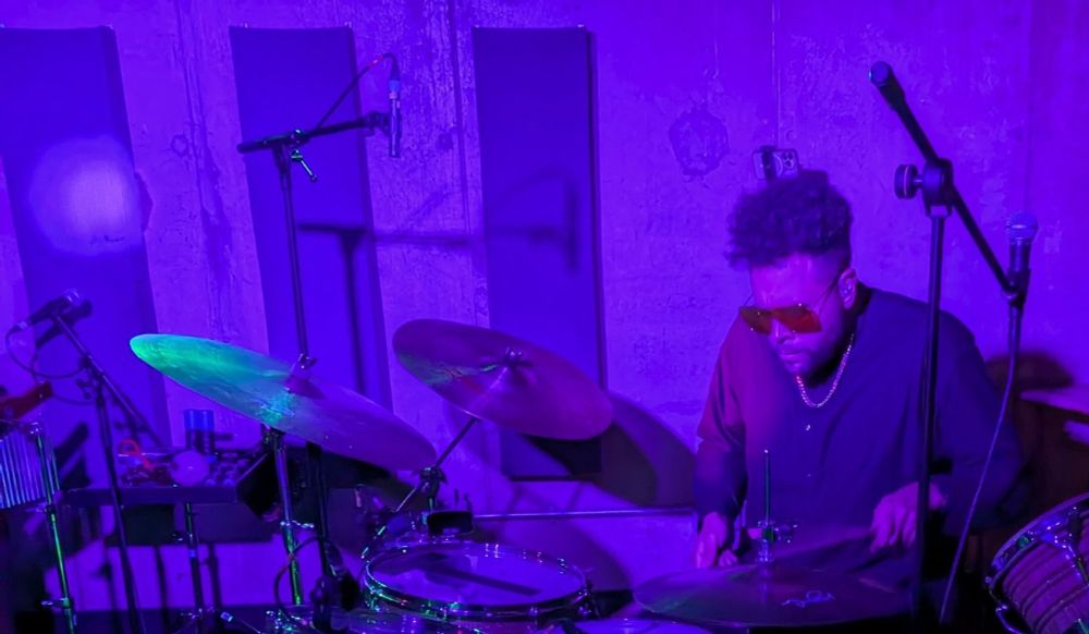 Kassa Overall playing the drums