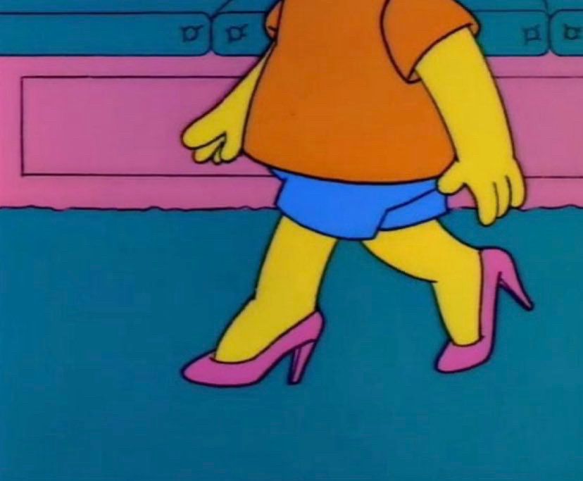 A screenshot from The Simpsons, showing Bart Simpson strutting in pink high heels. 