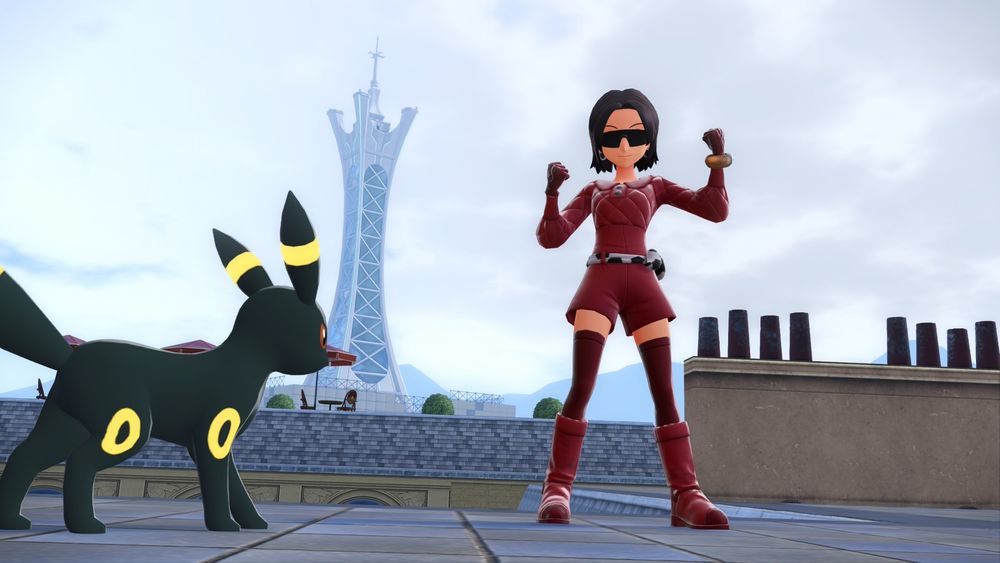 Pokemon Avatar dressed up in red, with Umbreon in front of tower