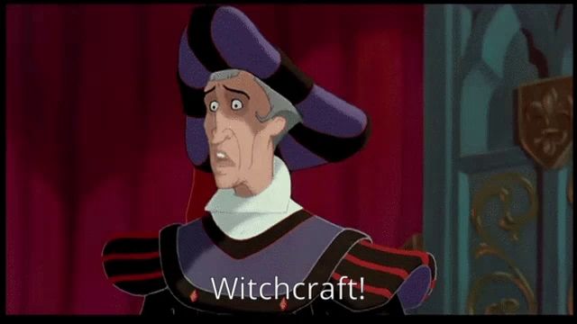 a cartoon character says witchcraft in front of a curtain