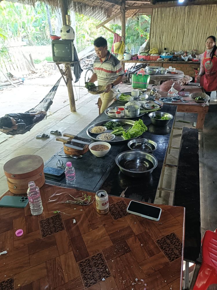 Our guide and the village kitchen.