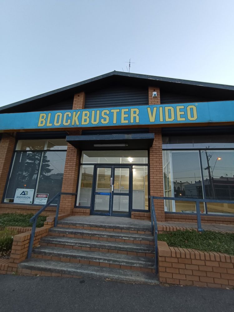 A building with a Blockbuster Video sign