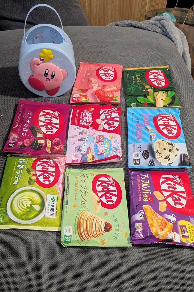 Japanese Kit Kat bars with a Kirby pail to give out at Furpocalypse tomorrow 