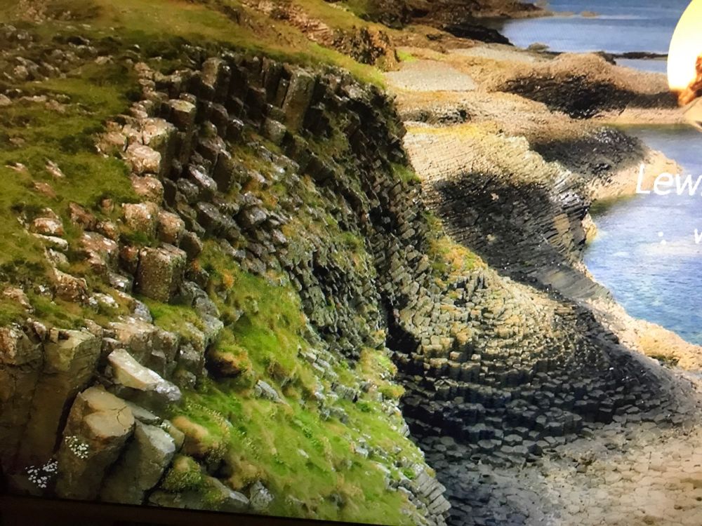Just booting up the computer to see a splash screen showing a load of columnar basalt