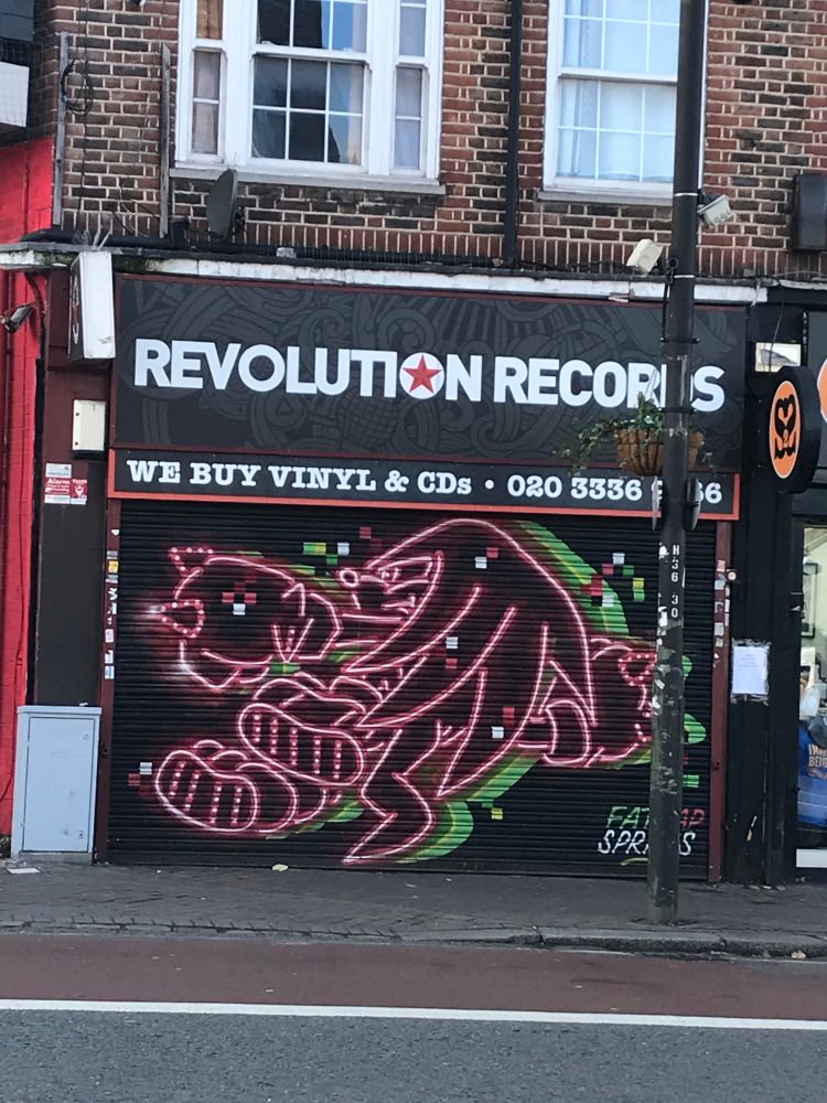 Revolution Records shutters adorned with a Knuckles mural