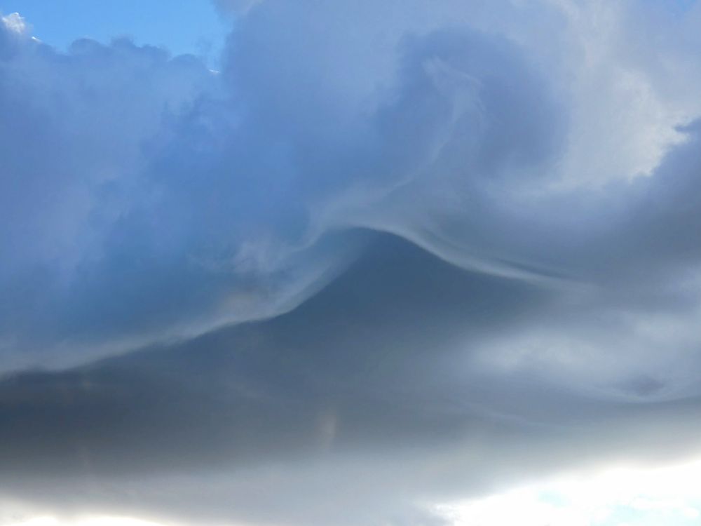 Blue and grey swirling clouds.