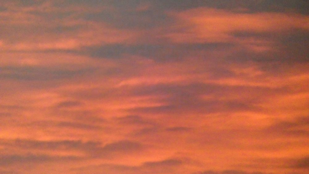 Pink and blue clouds and sky. 
