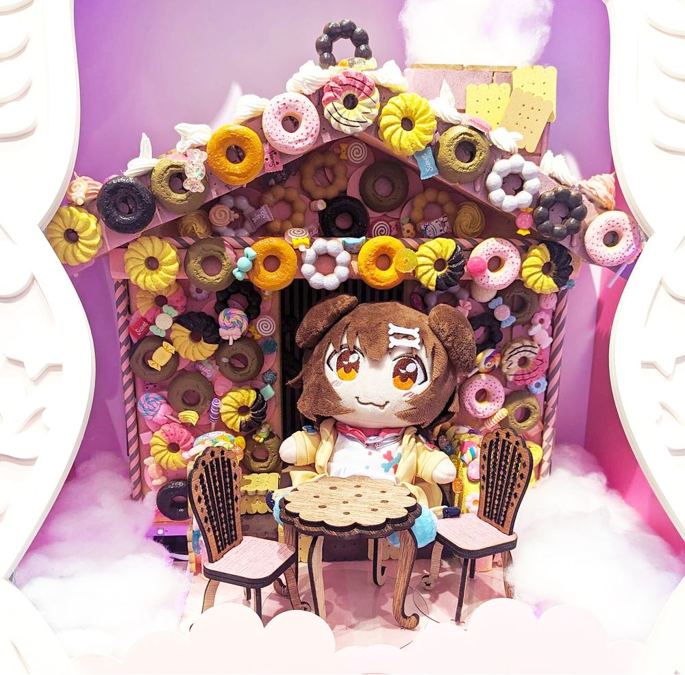 Korone plush in a sweets house