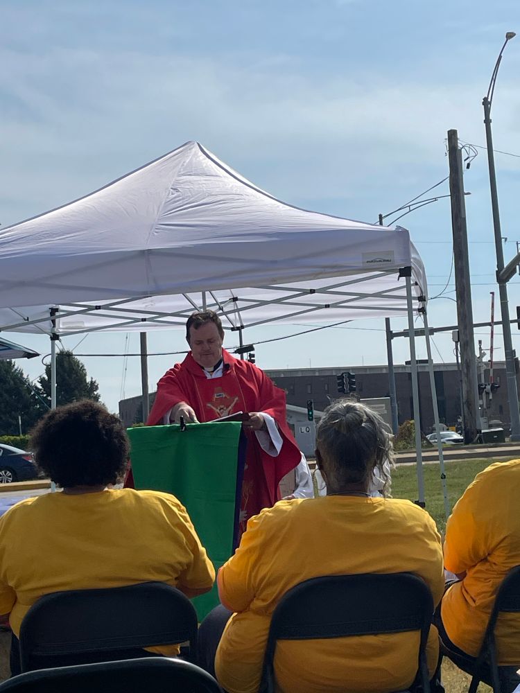 Priest celebrating the Eucharist