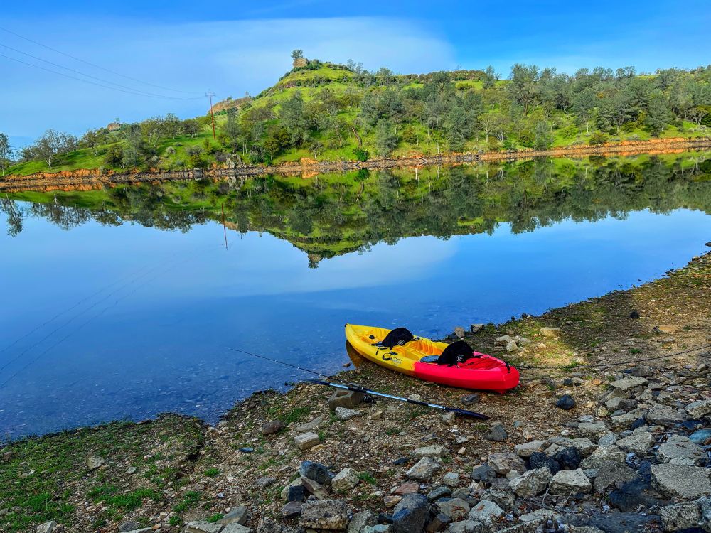 My by the edge of a glass-like lake.