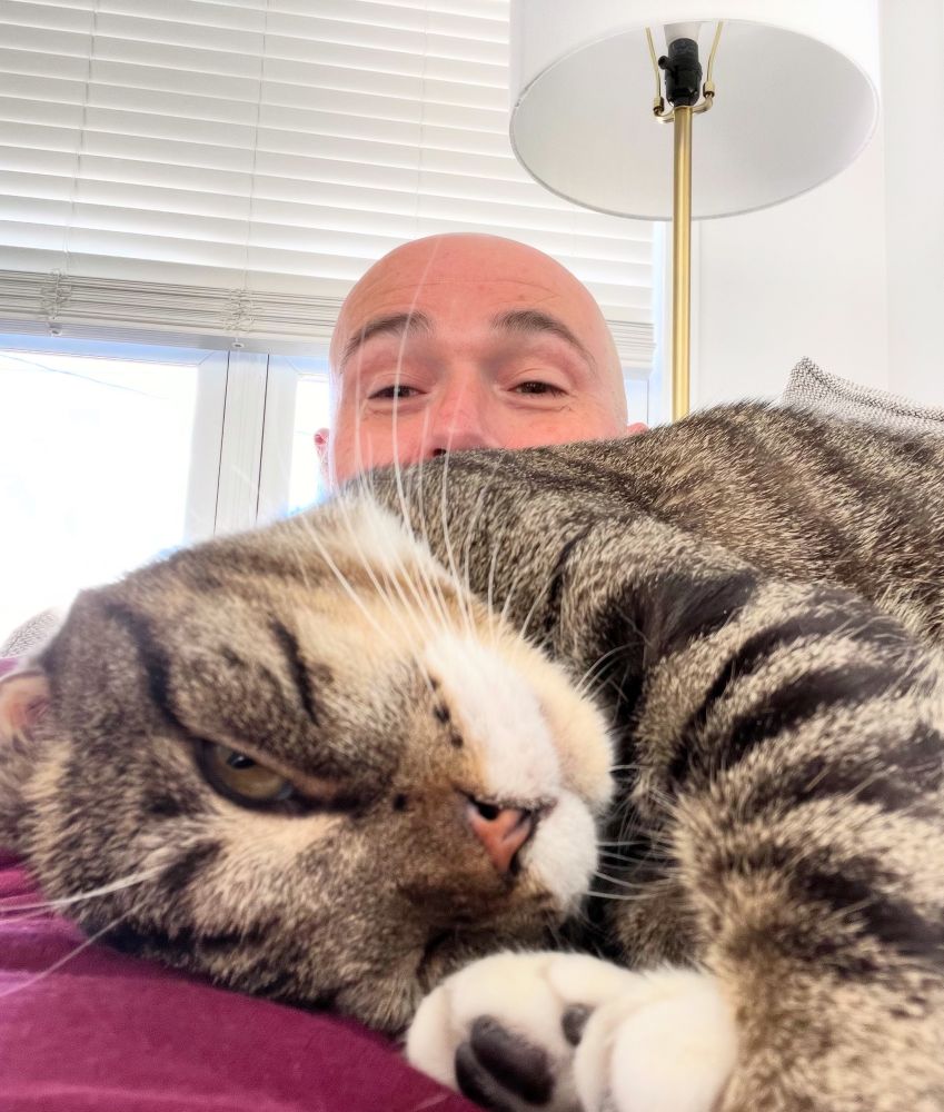 Selfie with me and my one eyed calico boy Nick Fury. 