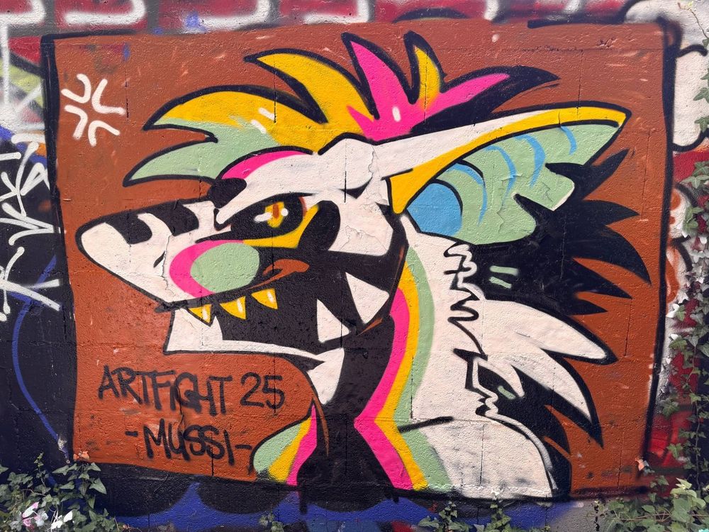 Graffiti of a colourful shark dragon