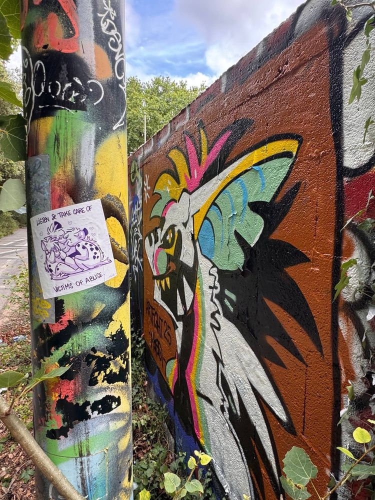Graffiti of a colourful shark dragon