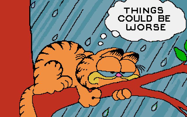 A pixel art image from what appears to be a Garfield computer game. Garfield is perched on a red tree branch in the rain, looking characteristically grumpy. A speech bubble above him reads 'THINGS COULD BE WORSE' against the blue rainy background.