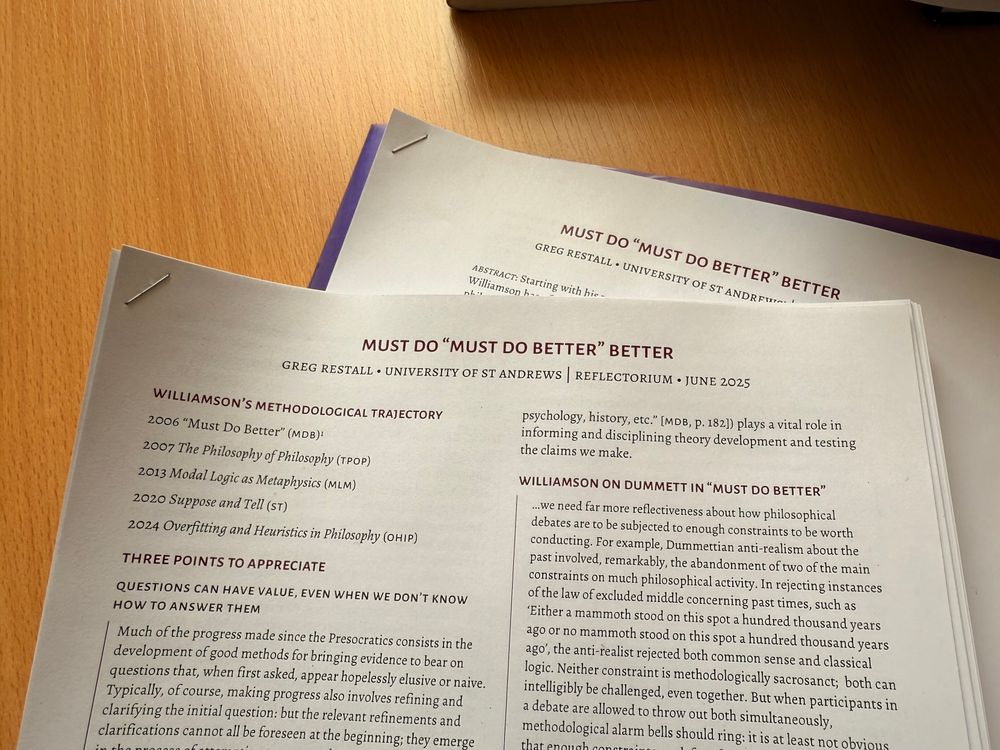 A pile of stapled handouts, with the title “Must Do “Must Do Better” Better”