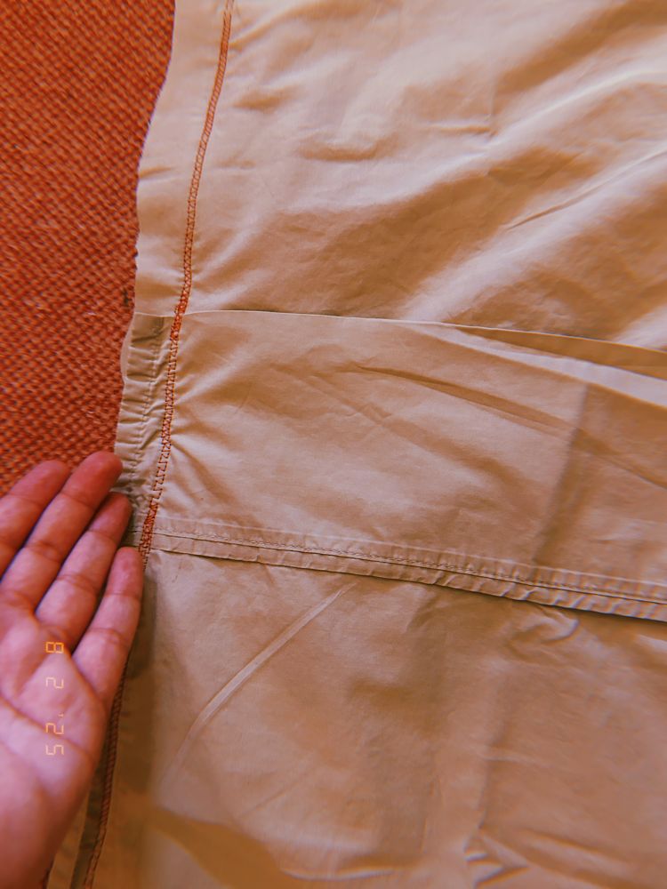 the overlapping edge of my envelope pillow cover. very clearly made out of an old bedsheet i repurposed ;)