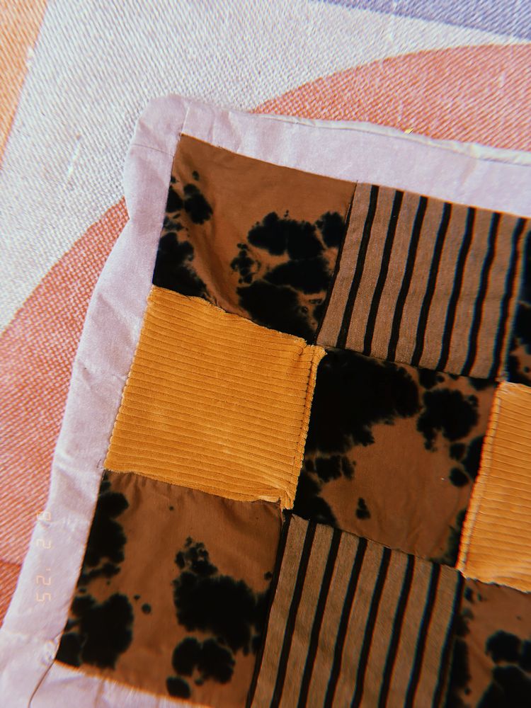 the edge of my pillow case, turned right side out. you can tell how poorly-made it is 😍