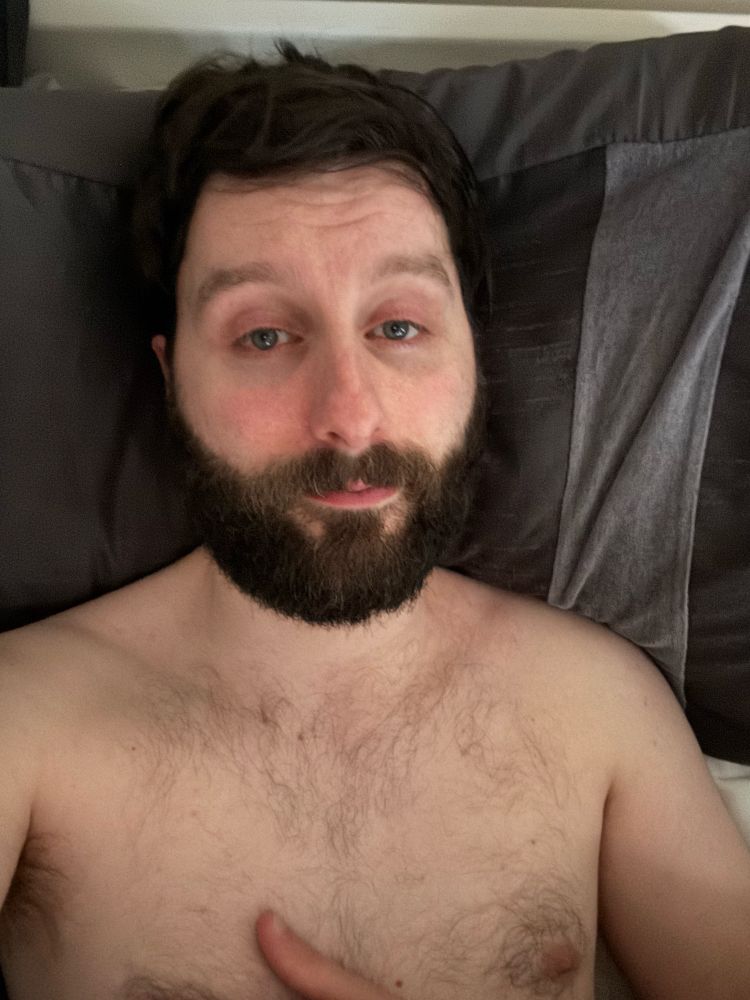 Restful bed selfie, still slightly sleepy eyed 