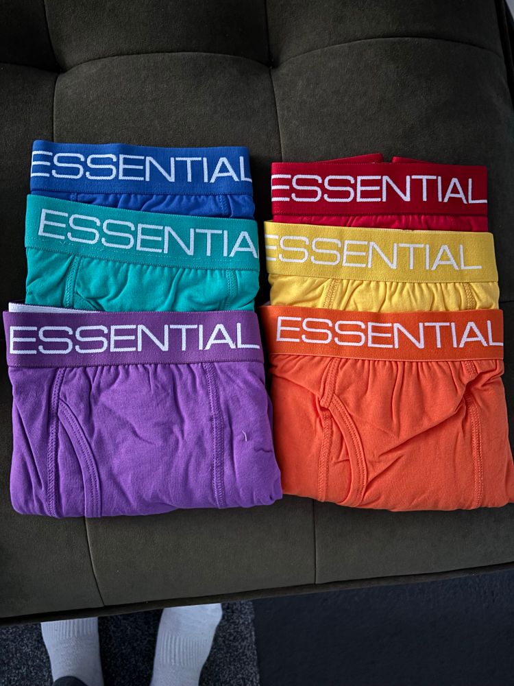Picture of my new colourful boxers purchase, I am not wearing them, six visible including blue, red, turquoise, yellow, purple and orange.  