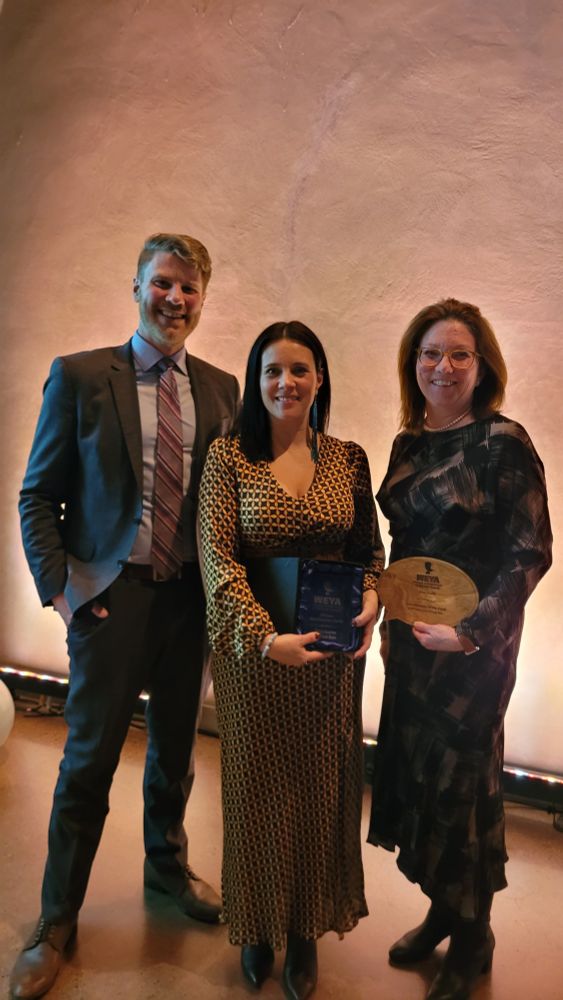 Award winners standing together.