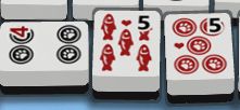 Three mahjong tiles; one a riichi declaration, the other two red fives immediately after.