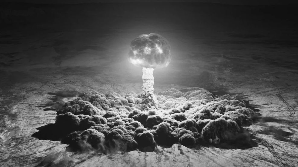 A black-and-white image of a mushroom cloud from a nuclear explosion.