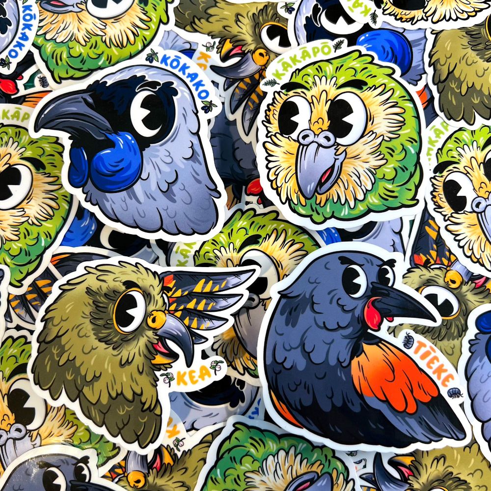 a flatlay of four native bird stickers, featuring the kokako, kakapo, kea, and tieke in rubberhose cartoon style